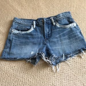 Distressed denim shorts